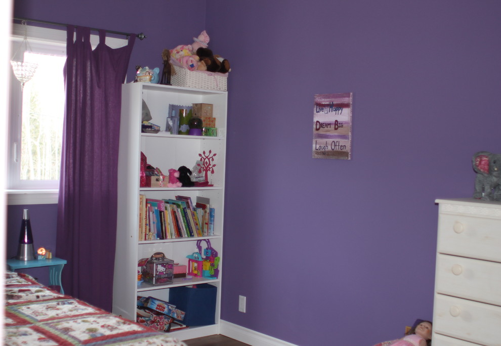 Photo of a medium sized contemporary bedroom in Other with purple walls, medium hardwood flooring and no fireplace.