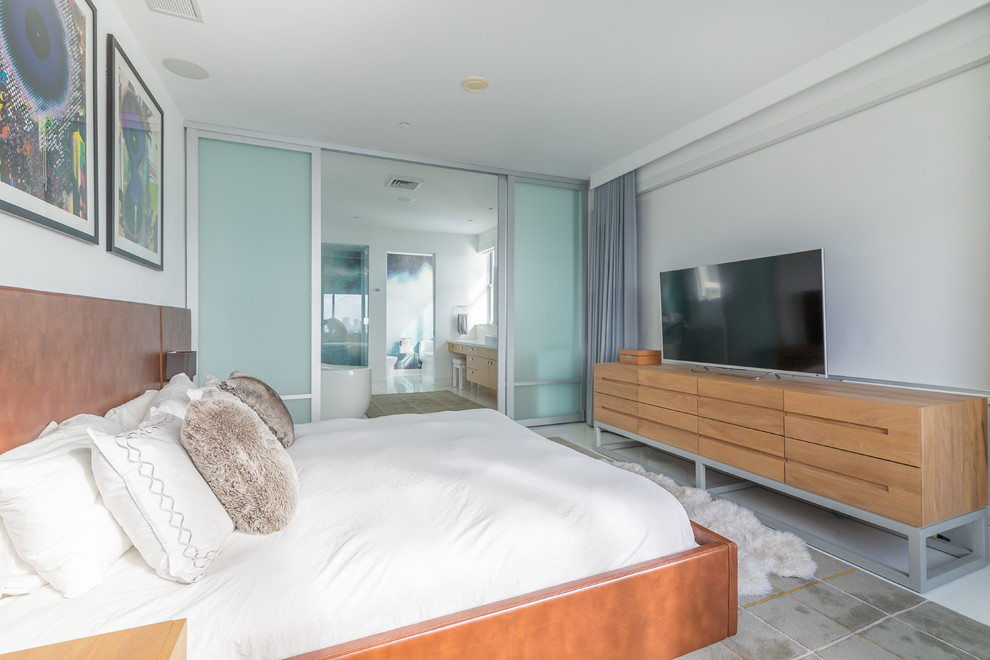 Design ideas for a medium sized contemporary master bedroom in Miami with white walls.