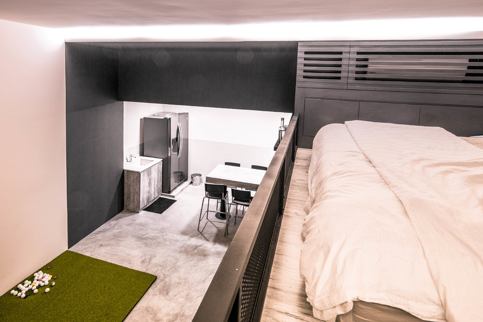 シンガポールにあるインダストリアルスタイルのおしゃれな寝室のインテリア