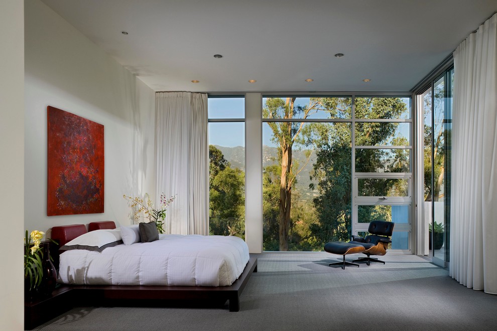 Inspiration for a contemporary master bedroom in Santa Barbara with white walls.