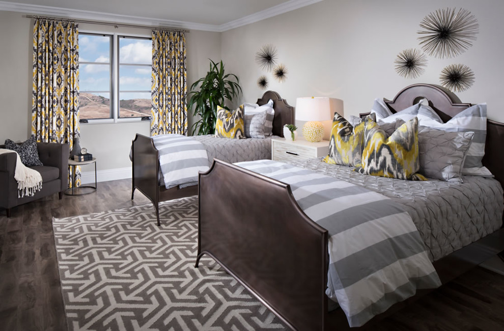 Large contemporary guest bedroom in San Diego with grey walls and medium hardwood flooring.