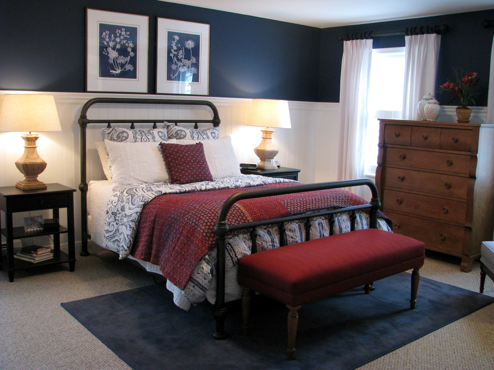 This is an example of a medium sized farmhouse master bedroom in Philadelphia with blue walls, carpet and no fireplace.