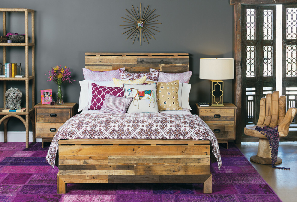 Inspiration for a contemporary bedroom remodel in Houston with gray walls