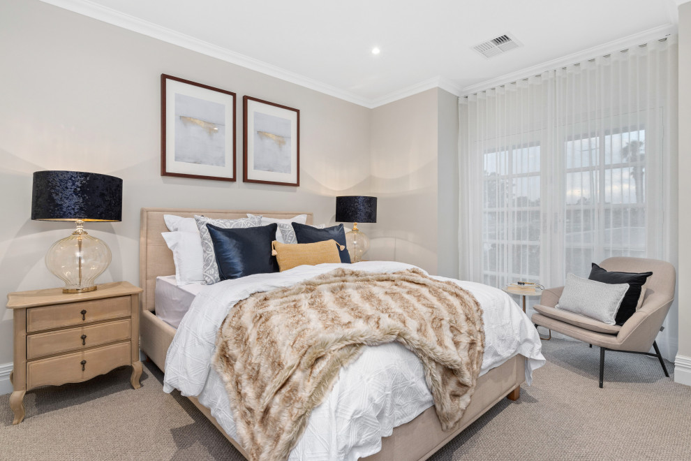 Photo of a traditional guest bedroom in Perth with beige walls, carpet, no fireplace and beige floors.