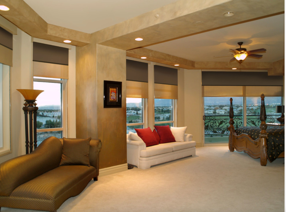 Inspiration for a large timeless master carpeted and beige floor bedroom remodel in San Diego with beige walls and no fireplace