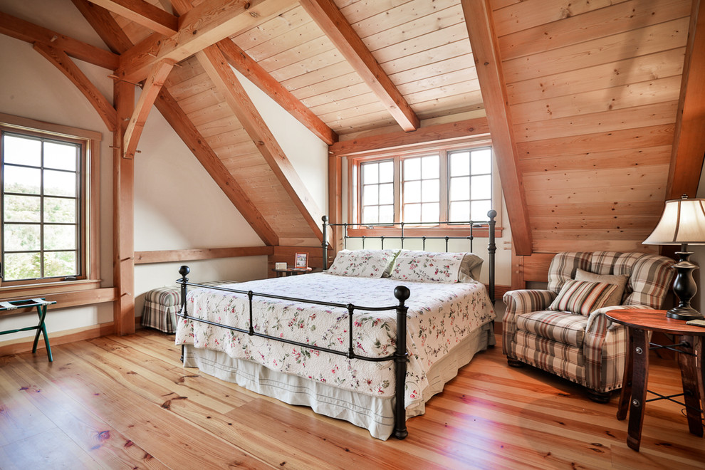 Bedroom - traditional guest medium tone wood floor bedroom idea in Boston with beige walls