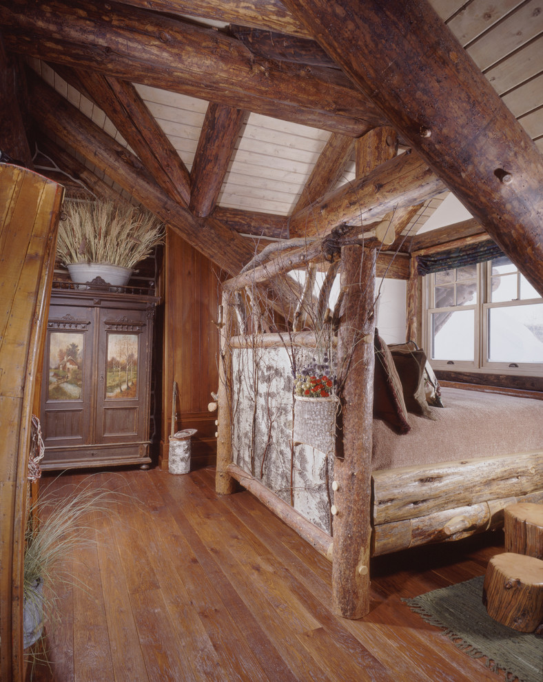 Inspiration for a rustic bedroom in Denver.