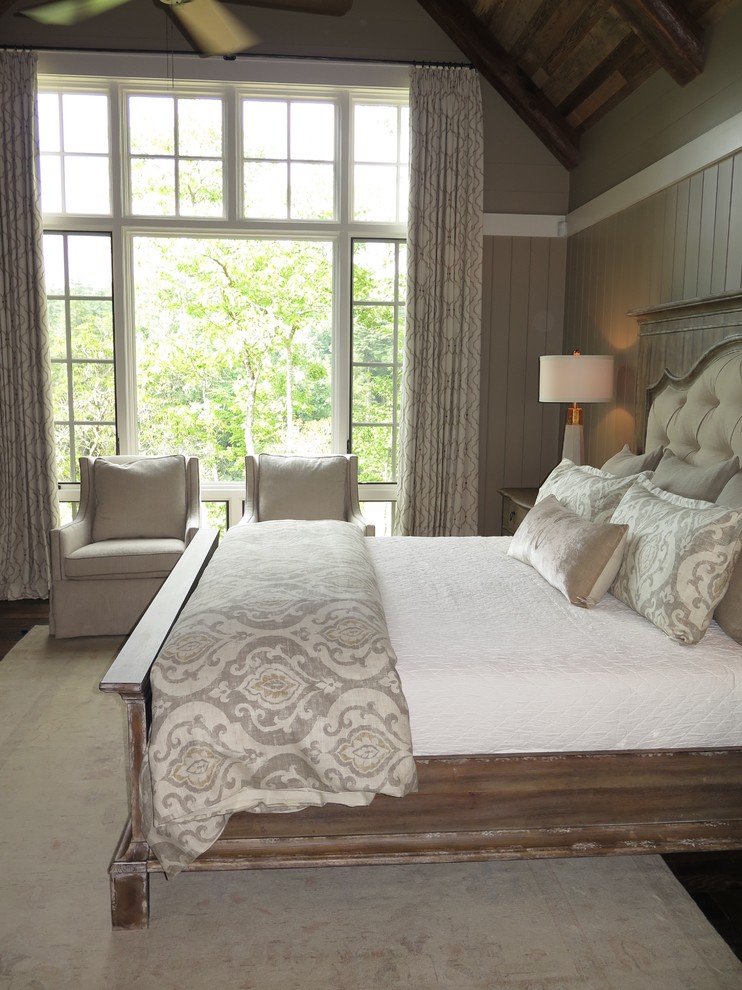 Example of a large transitional master dark wood floor bedroom design in Atlanta with beige walls and no fireplace