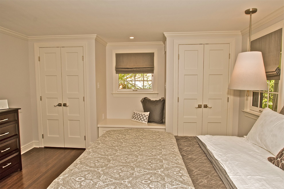 Medium sized traditional master bedroom in Other with grey walls and dark hardwood flooring.