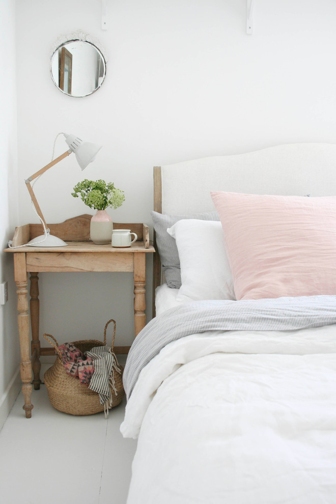 Inspiration for an eclectic grey and brown bedroom in London.
