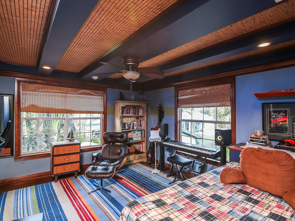 Bedroom - mid-sized eclectic dark wood floor bedroom idea in Miami with blue walls