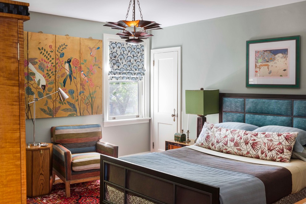 Example of a mid-sized eclectic guest light wood floor bedroom design in Philadelphia with blue walls and no fireplace