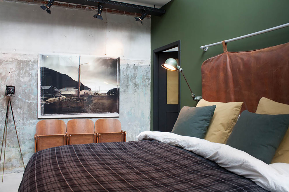 Bedroom - industrial bedroom idea in Amsterdam with green walls