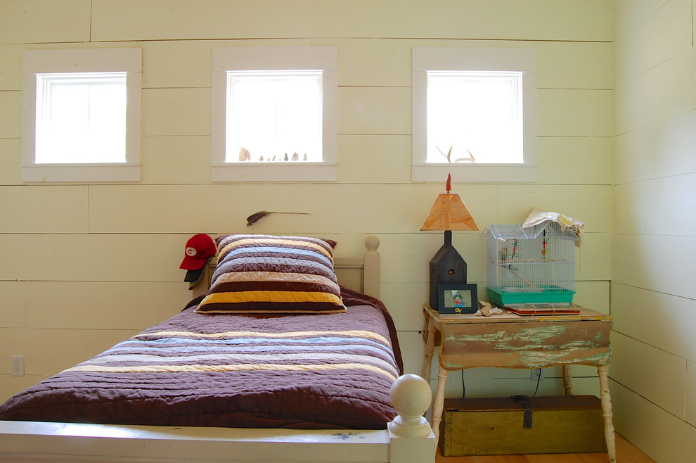 Inspiration for a shabby-chic style bedroom remodel in New York with white walls