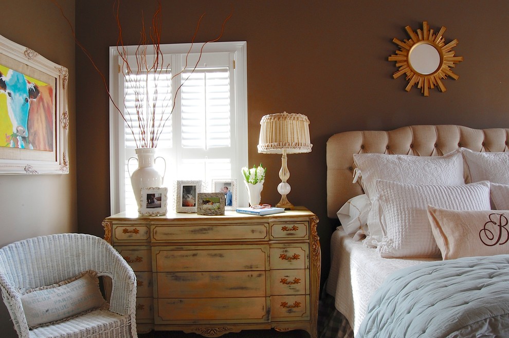 French country bedroom photo in New York with brown walls