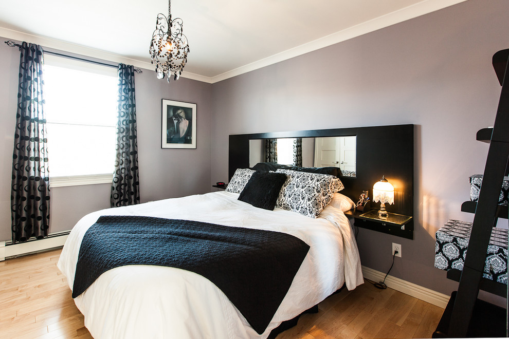 Bedroom - contemporary medium tone wood floor bedroom idea in Other with gray walls