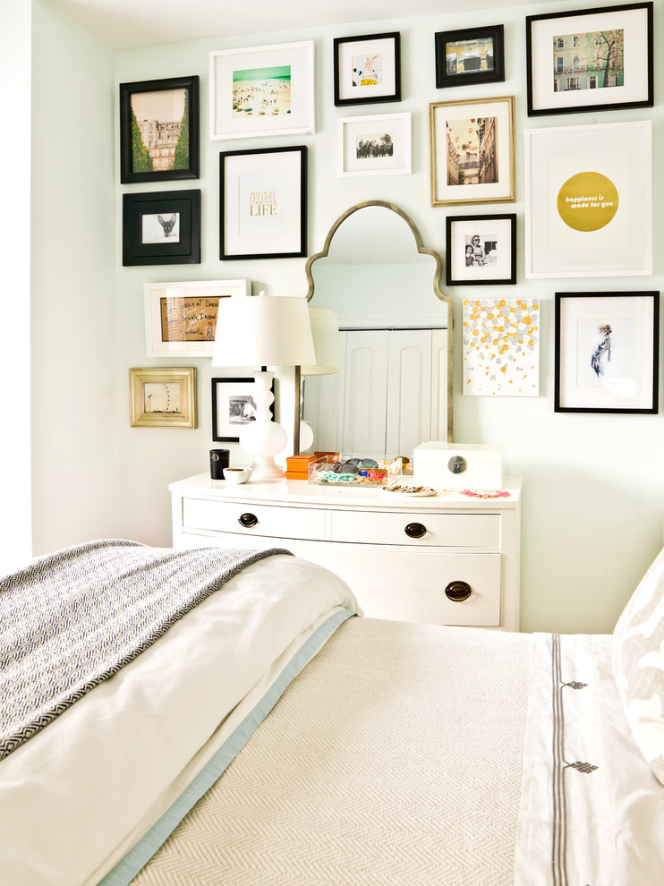 Inspiration for an eclectic bedroom remodel in Chicago with white walls