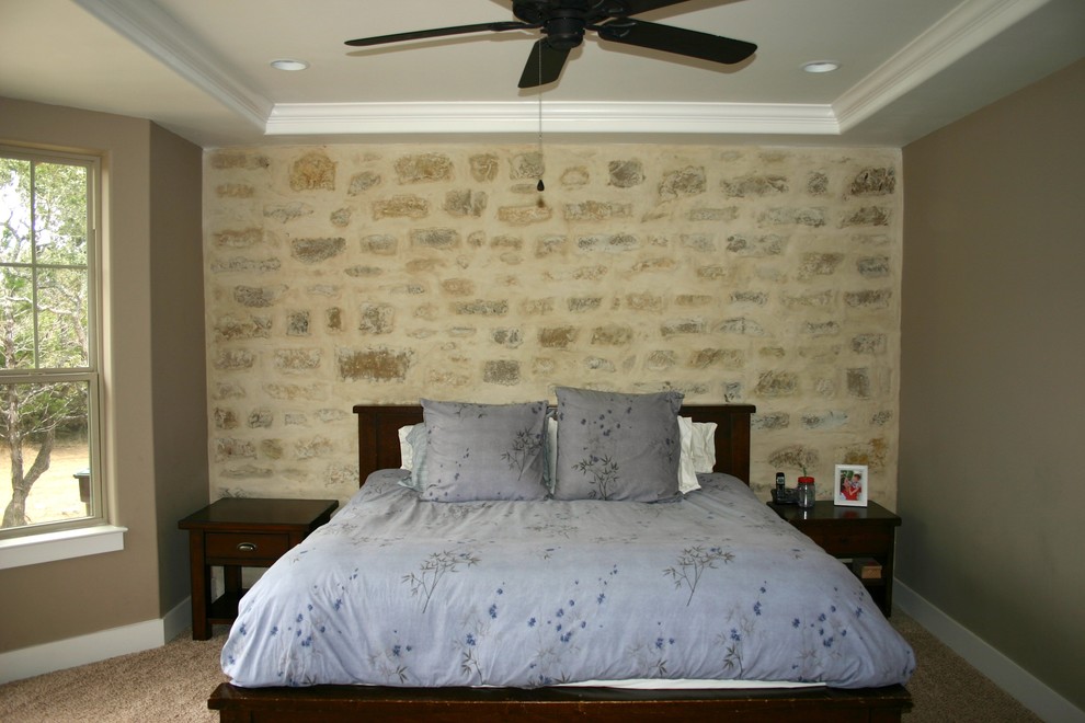 Mid-sized farmhouse master carpeted and beige floor bedroom photo in Austin with brown walls