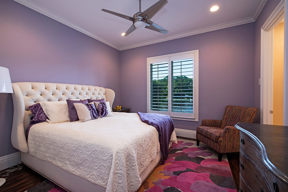 Inspiration for a large transitional dark wood floor bedroom remodel in Miami