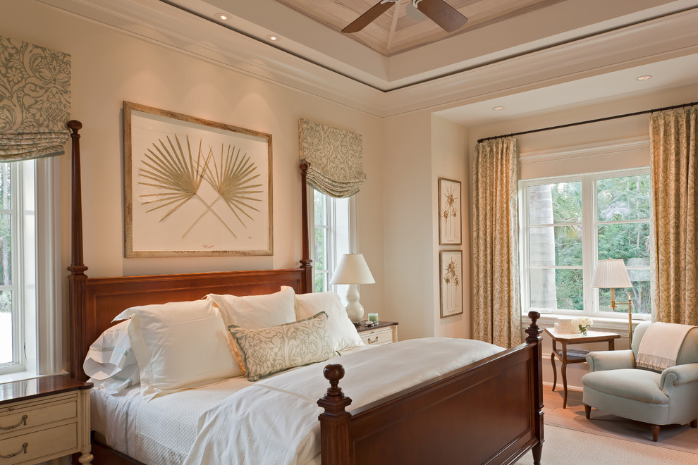 Elegant master bedroom photo in Boston with beige walls