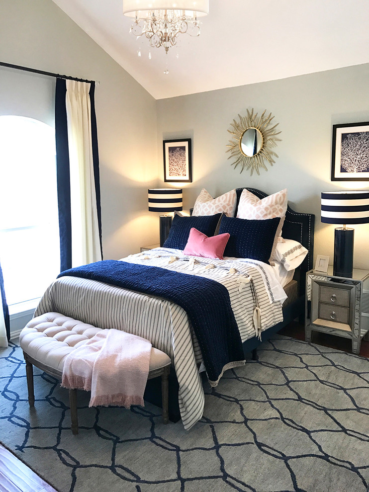 Bedroom - small contemporary guest laminate floor and brown floor bedroom idea in Dallas with gray walls