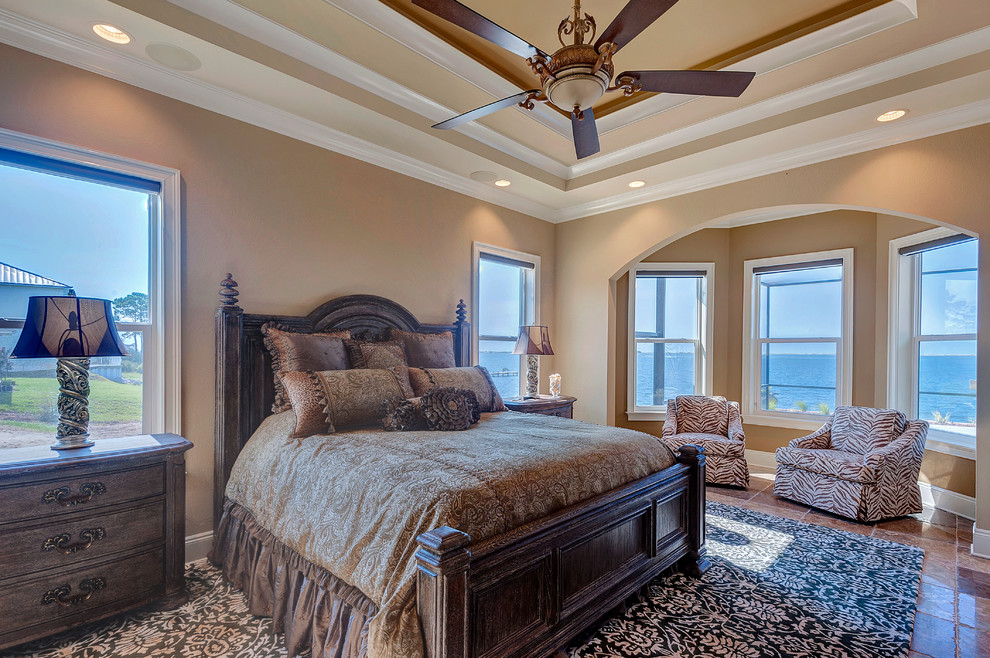 Design ideas for a large classic master bedroom in Miami with beige walls and no fireplace.