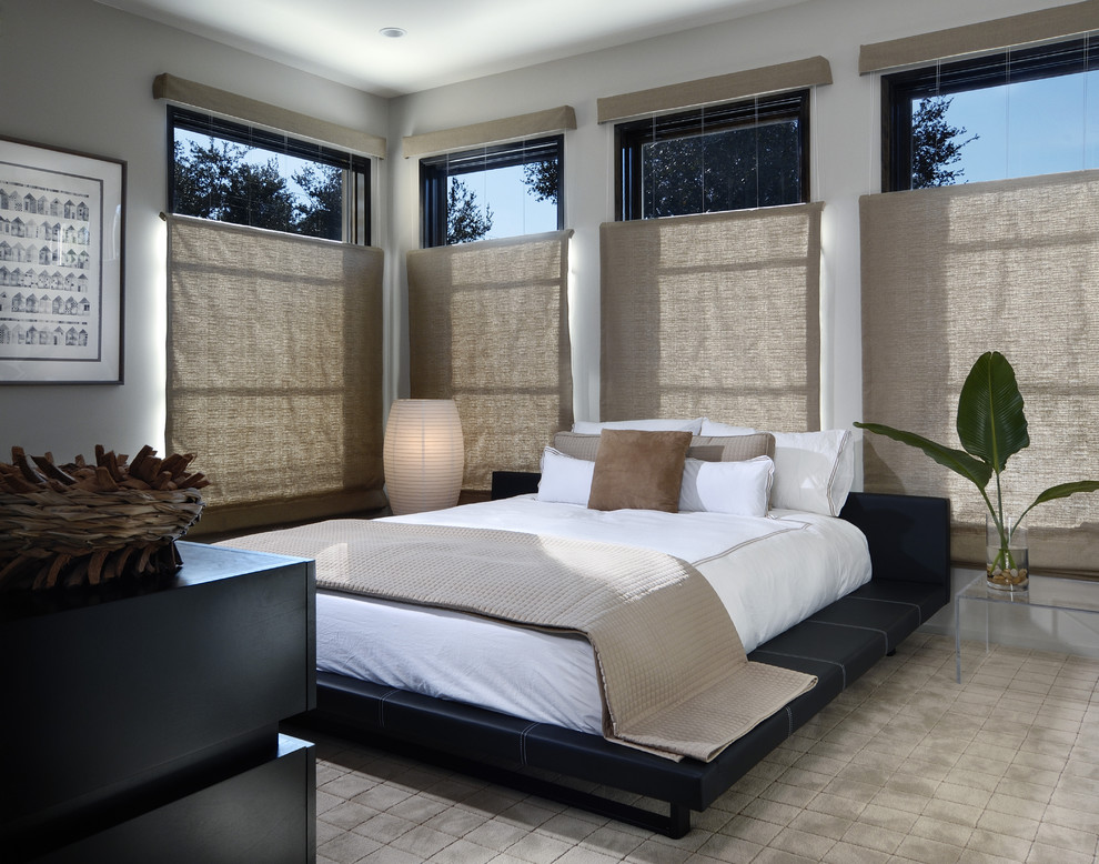 Inspiration for a modern carpeted bedroom remodel in Orlando with white walls