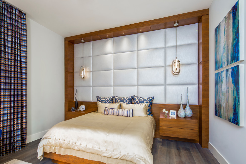 Inspiration for a contemporary master dark wood floor and brown floor bedroom remodel in Austin with white walls