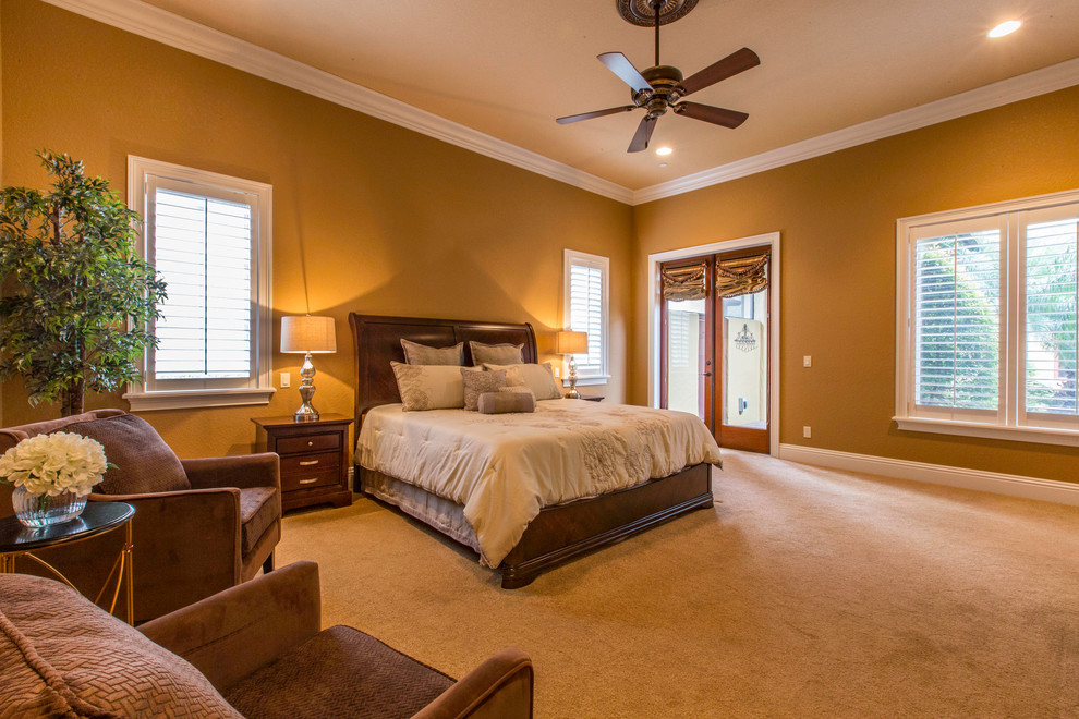 Photo of an expansive master bedroom in Tampa.