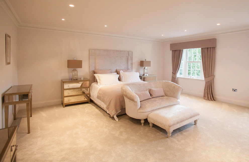 This is an example of a contemporary bedroom in Surrey.