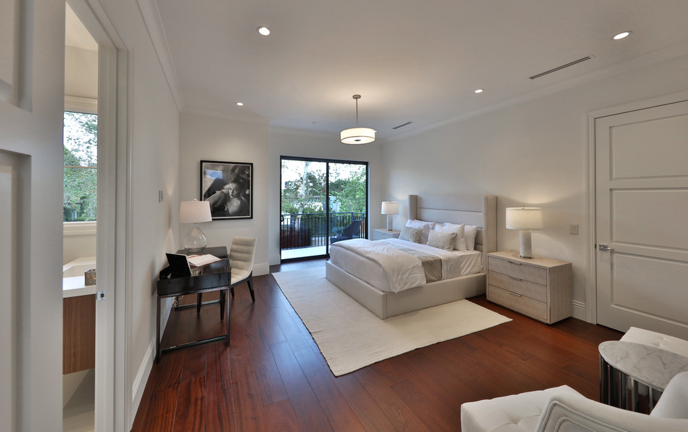 Bedroom - mid-sized contemporary guest medium tone wood floor and brown floor bedroom idea in Los Angeles with white walls