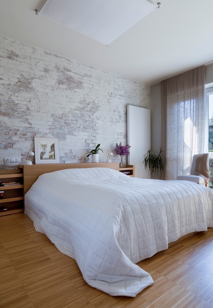 Bedroom - transitional medium tone wood floor bedroom idea in Other with white walls