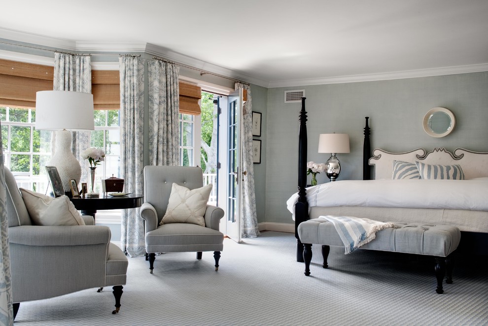 This is an example of a large traditional master bedroom in Boston with grey walls, carpet and grey floors.