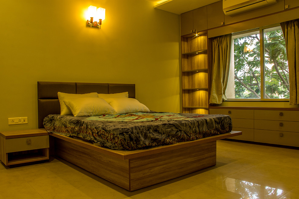 Design ideas for a contemporary bedroom in Pune.