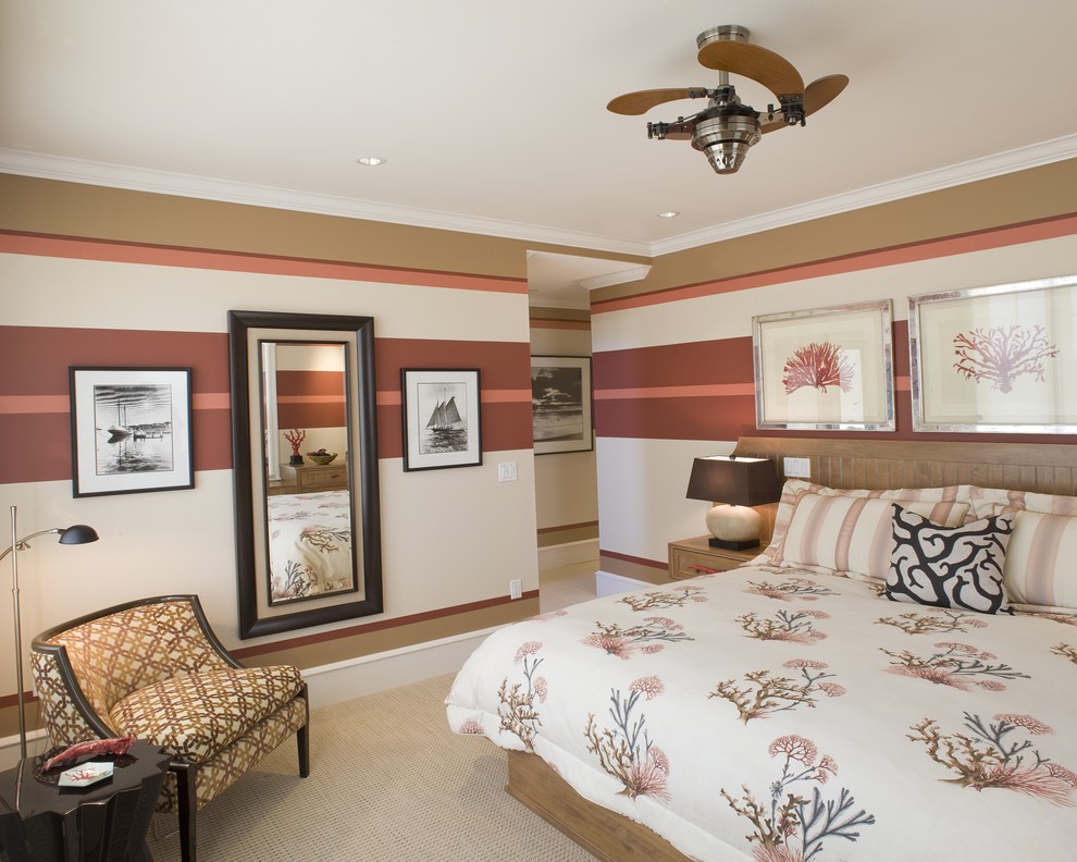 Imagen de dormitorio contemporáneo con paredes multicolor y moqueta