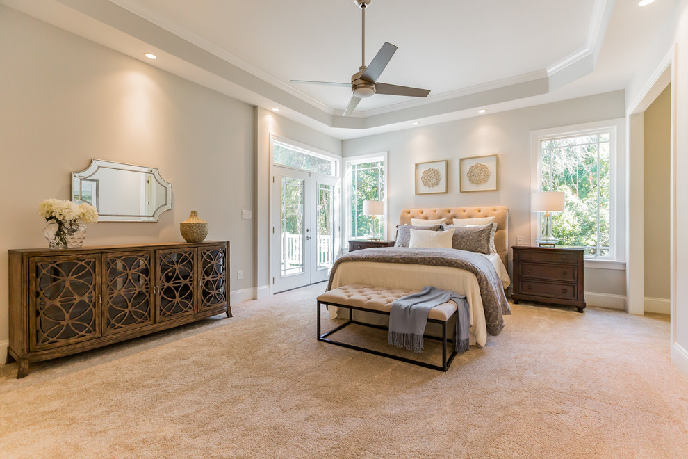 Example of a large classic master carpeted and beige floor bedroom design in Philadelphia with beige walls
