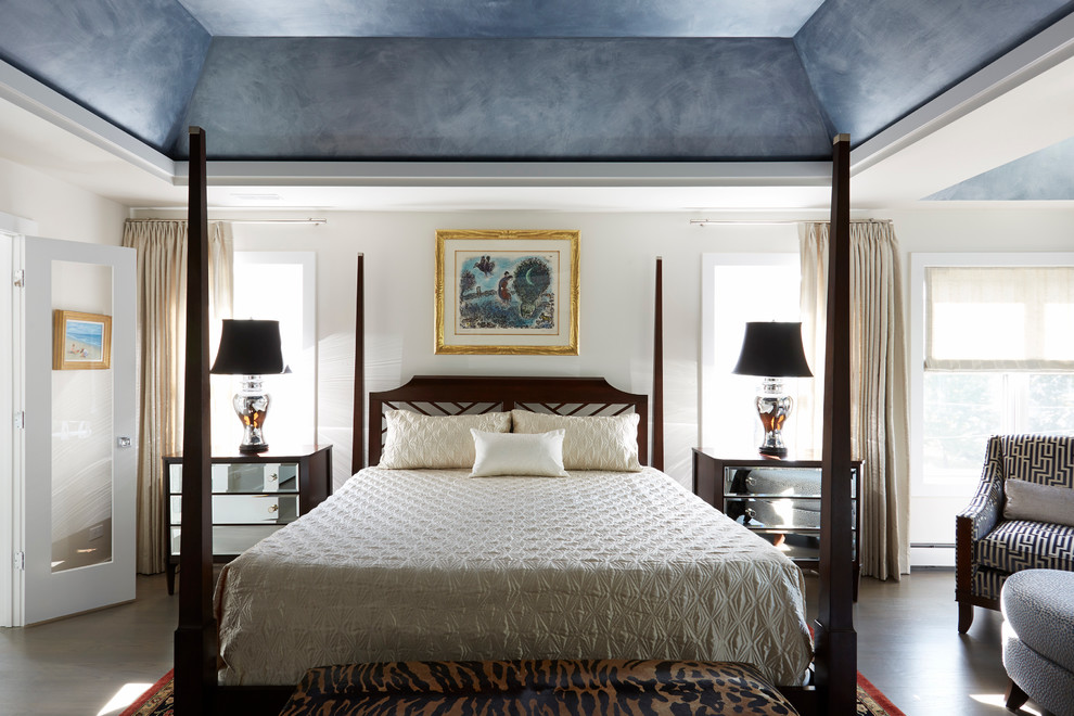 Example of a large trendy master medium tone wood floor bedroom design in Chicago with beige walls