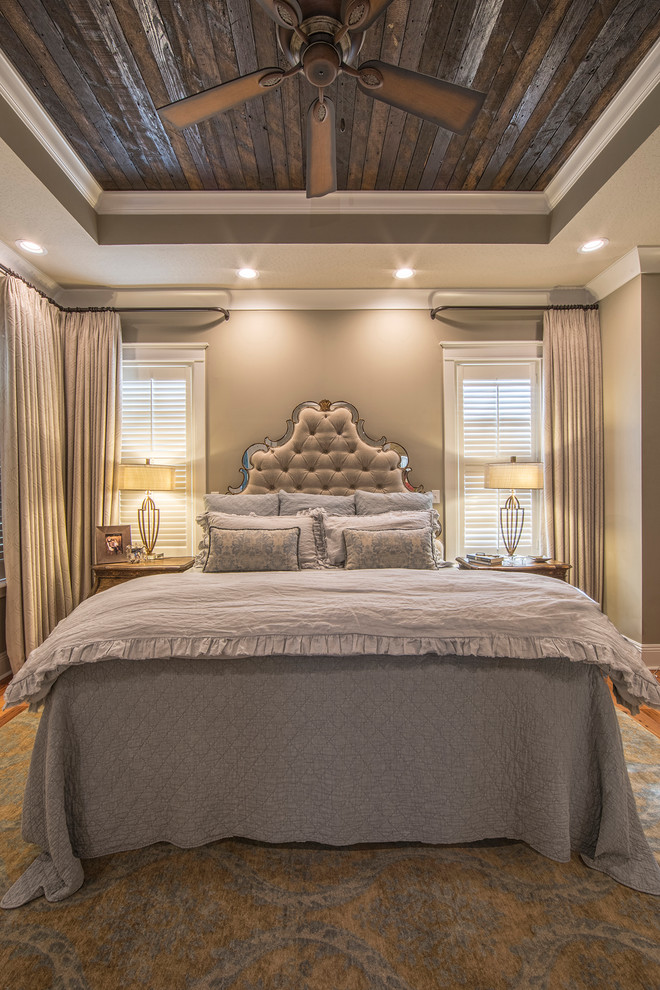 Inspiration for a large traditional master and grey and brown bedroom in Other with grey walls, light hardwood flooring and brown floors.
