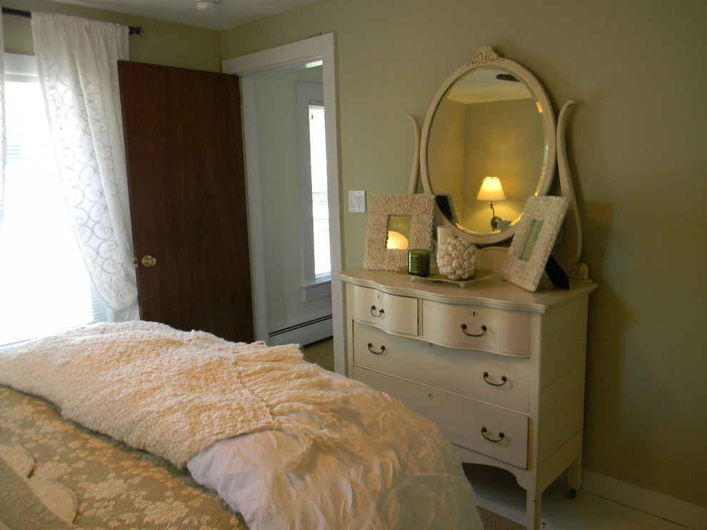 Inspiration for a medium sized classic guest bedroom in Burlington with green walls and painted wood flooring.