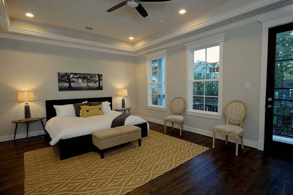 Inspiration for a large classic master bedroom in Houston with grey walls, dark hardwood flooring and no fireplace.