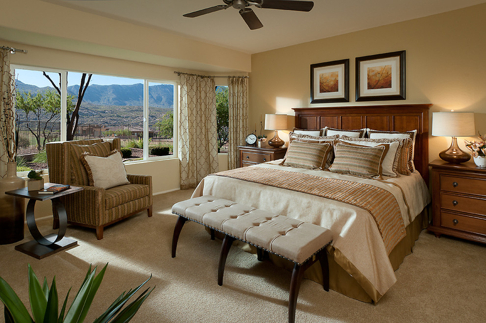 Design ideas for a medium sized traditional master bedroom in Phoenix with beige walls, carpet, no fireplace and beige floors.