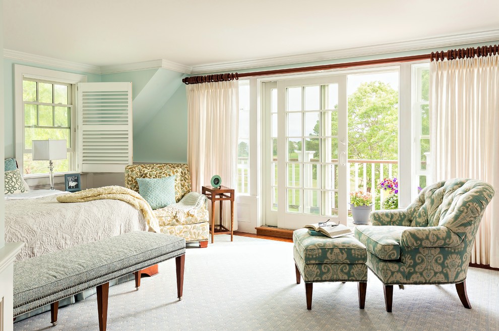Traditional master bedroom in Boston with no fireplace and blue walls.