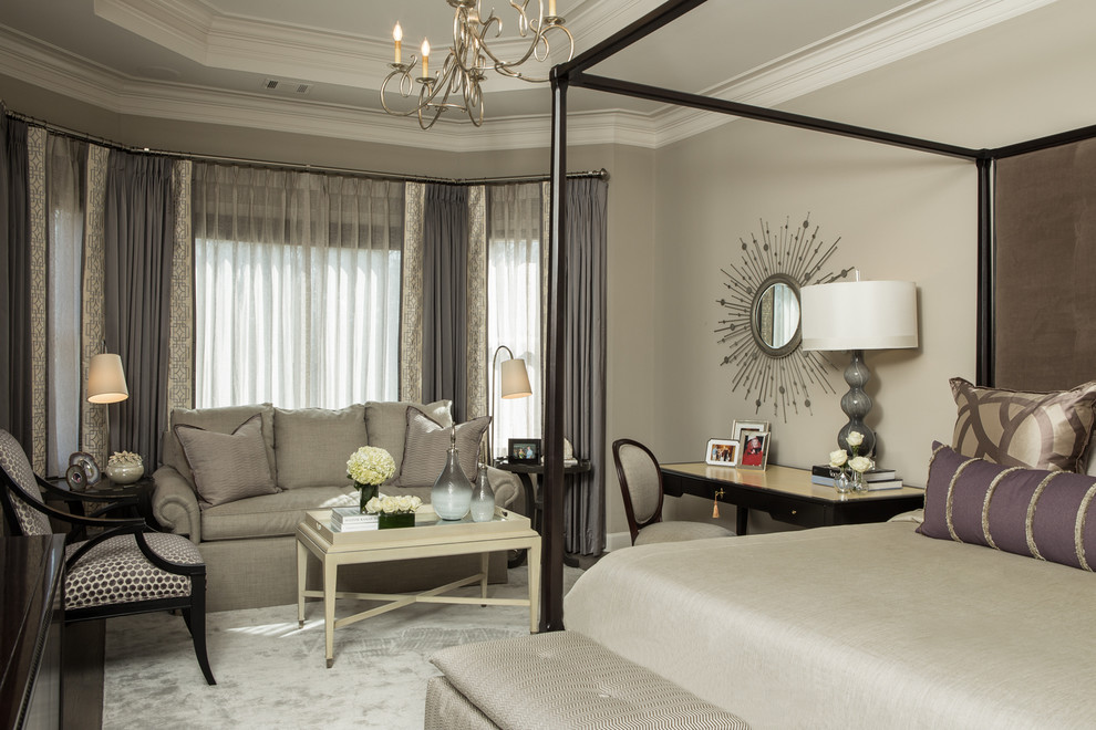 Large elegant master bedroom photo in Atlanta with beige walls