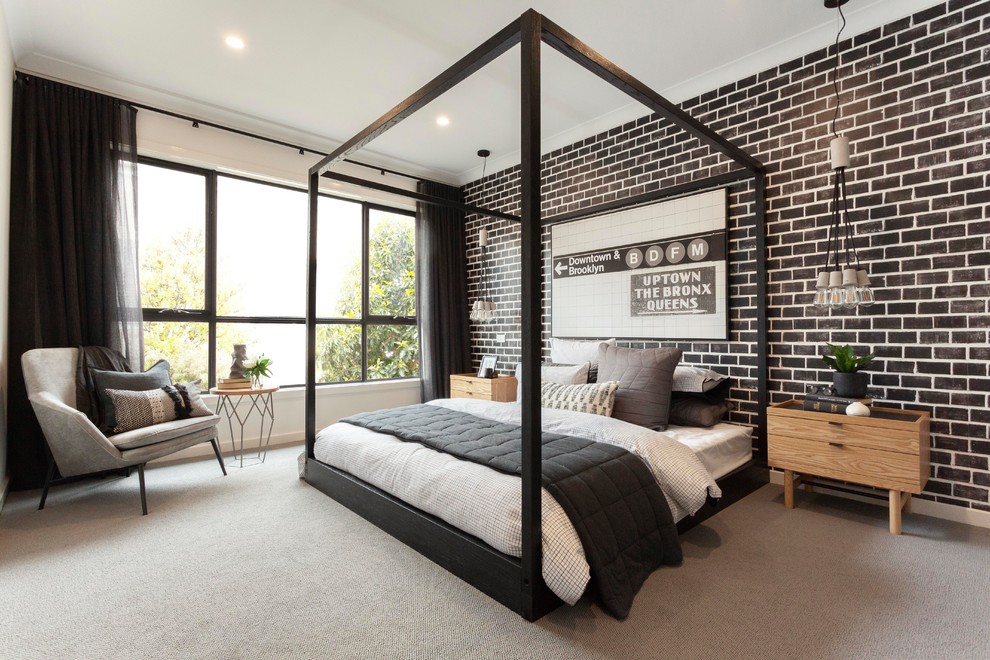 Стильный дизайн: спальня в стиле лофт с черными стенами, ковровым покрытием и серым полом - последний тренд