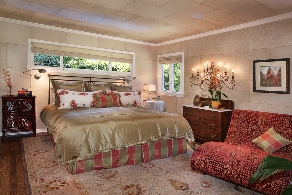 Medium sized bohemian master bedroom in Orange County with beige walls, no fireplace and medium hardwood flooring.