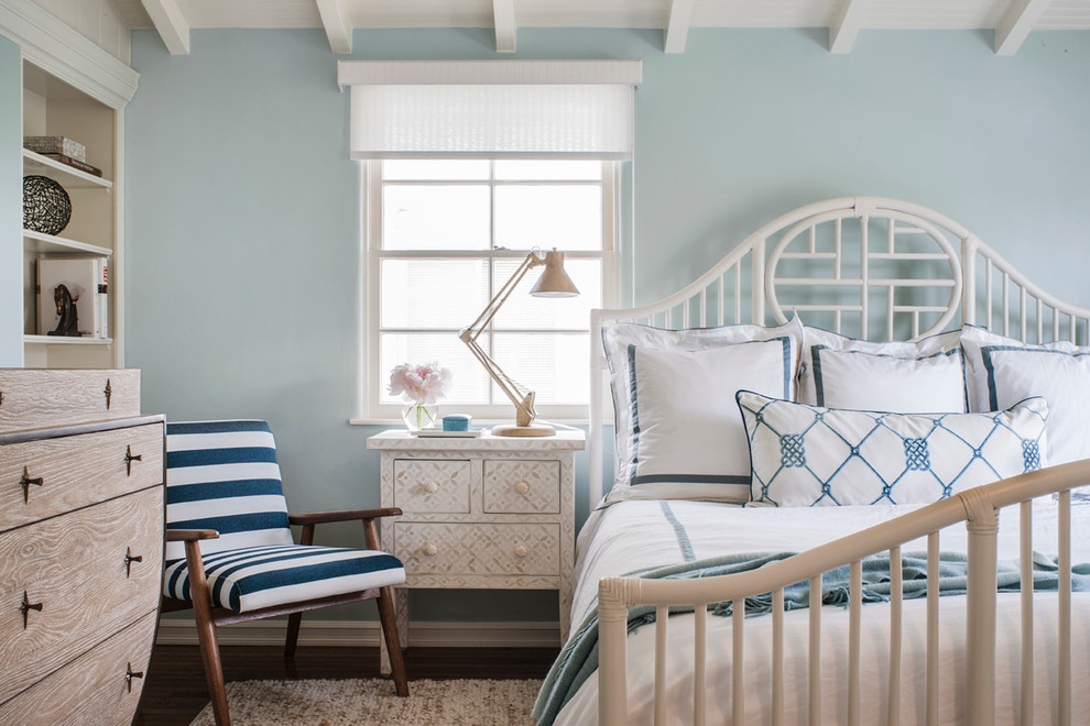 Inspiration for a coastal master bedroom remodel in Seattle with blue walls