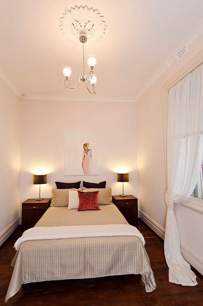 Elegant dark wood floor bedroom photo in Perth with white walls