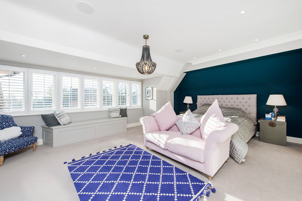 Inspiration for a nautical master and grey and pink bedroom in Hertfordshire with blue walls, carpet and beige floors.
