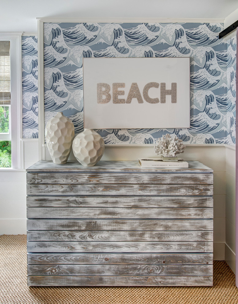 Mid-sized beach style carpeted bedroom photo in New York with beige walls and no fireplace