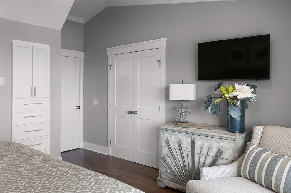 Inspiration for a medium sized contemporary master and grey and silver bedroom in Charleston with grey walls, medium hardwood flooring and no fireplace.